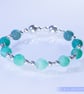 Beaded bracelet with crackle glass and sterling silver green blue stretchy - Image 2