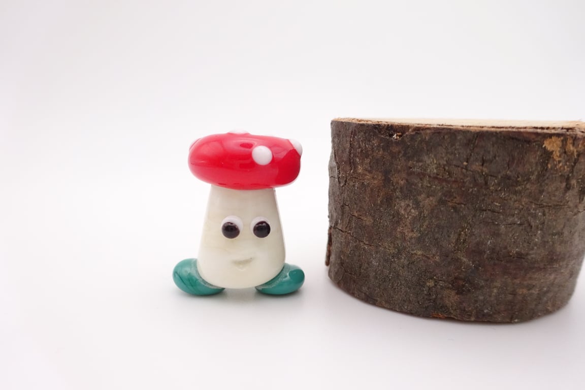 small glass toadstool man