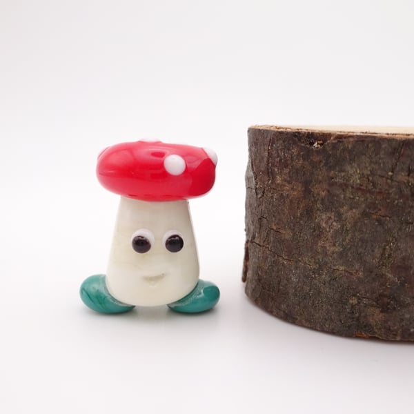 small glass toadstool man