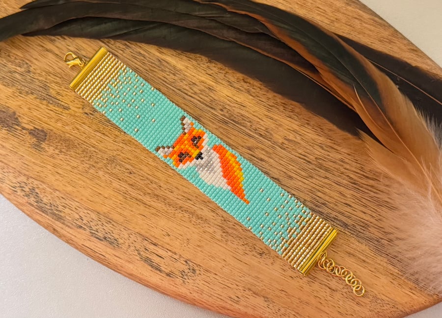 Colourful bead woven fox cuff bracelet in orange and turquoise 