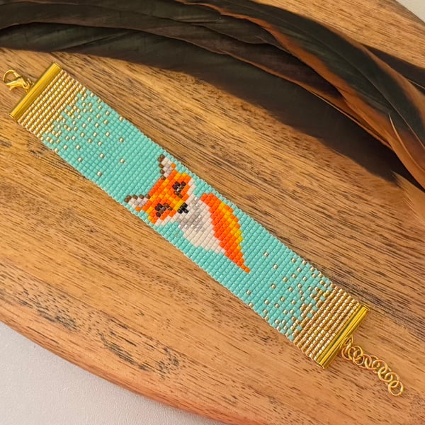 Colourful bead woven fox cuff bracelet in orange and turquoise 