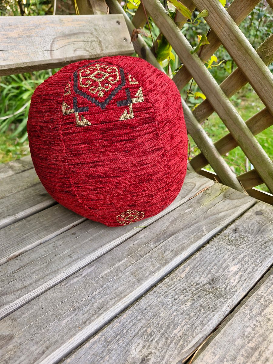 Large, decorative, christmas, red and gold fabric bauble ball.