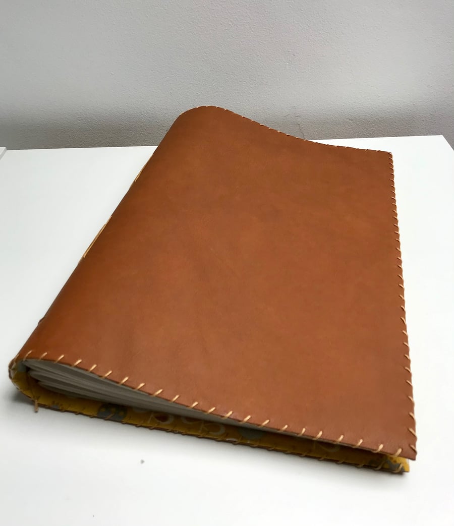 A4 brown leather notebook sketchbook with floral fabric lining 