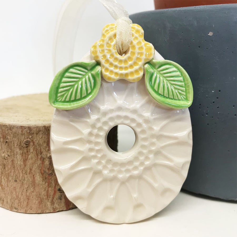 Pottery Easter Egg decoration with yellow flower