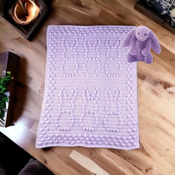 Crochet baby blanket in lilac with puff bobbly bunny pattern