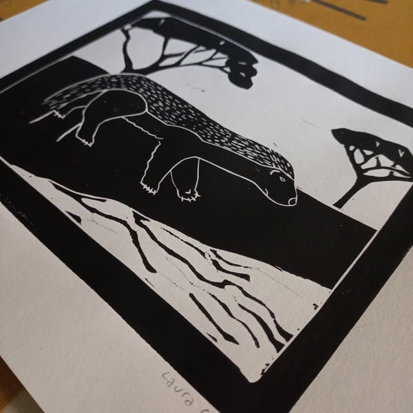 A4 lino print of honey badger on recycled paper (black on white)