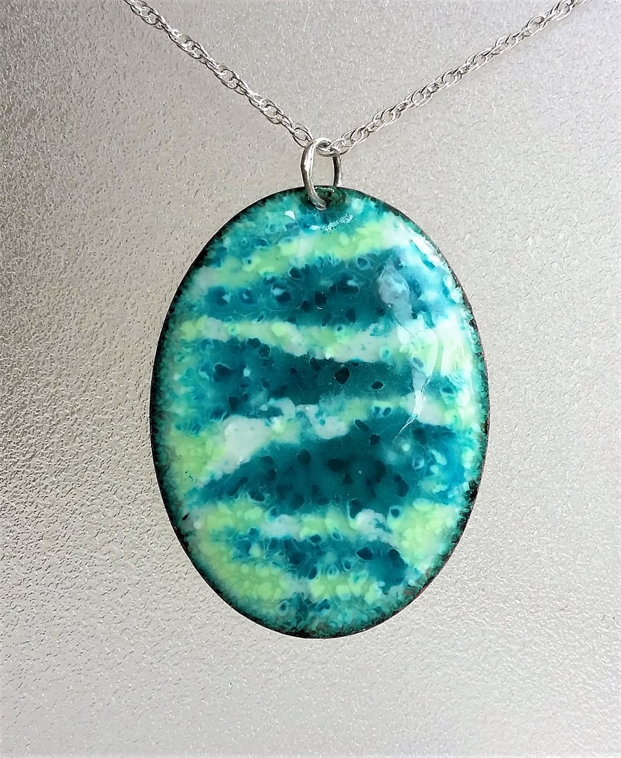Enamelled oval pendant in blues and greens 031