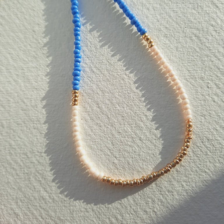 Glass beaded necklace, cornflower blue, cream, gold, 16 to 18 inches