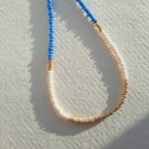 Glass beaded necklace, cornflower blue, cream, gold, 16 to 18 inches