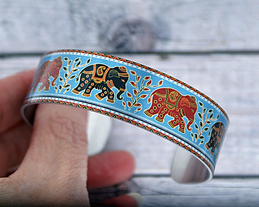 Elephant cuff bracelet, blue metal jewellery bangle. (548)              