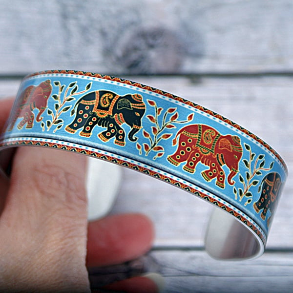 Elephant cuff bracelet, blue metal jewellery bangle. (548)              