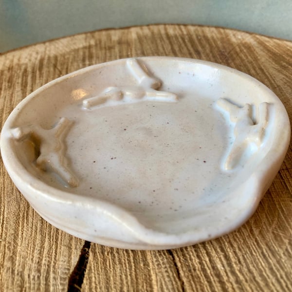 Handmade ceramic spoon rest wheel thrown white hare tea bag holder spoon rest. 