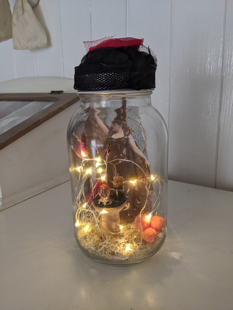 Victorian halloween witch in a jar with lights.. Halloween fairy lights.