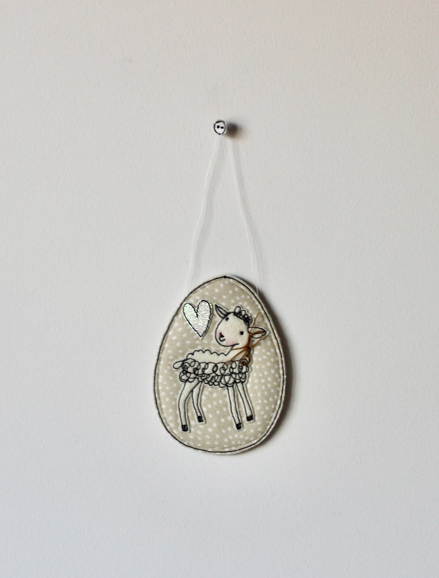 'Lamb on a Dotty Cream Egg with a White Glitter Heart 5' - Hanging Decoration