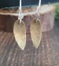 Brass and silver leaf drop dangly earrings - Image 1