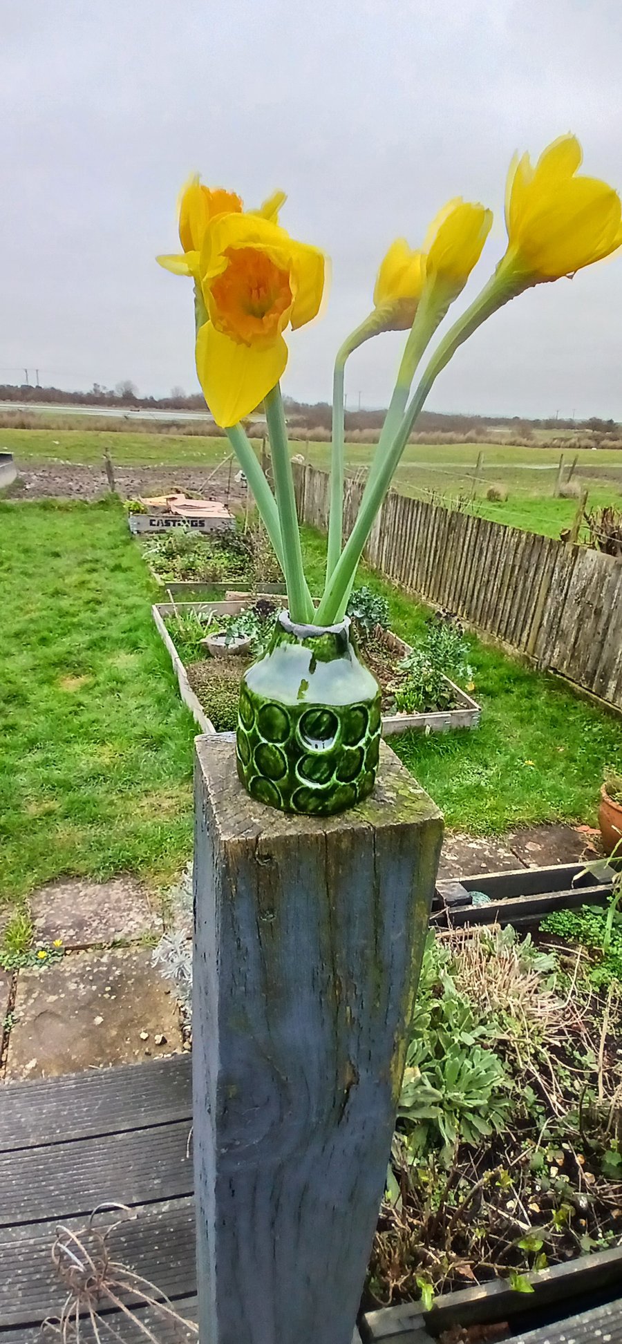 Small green bud vase