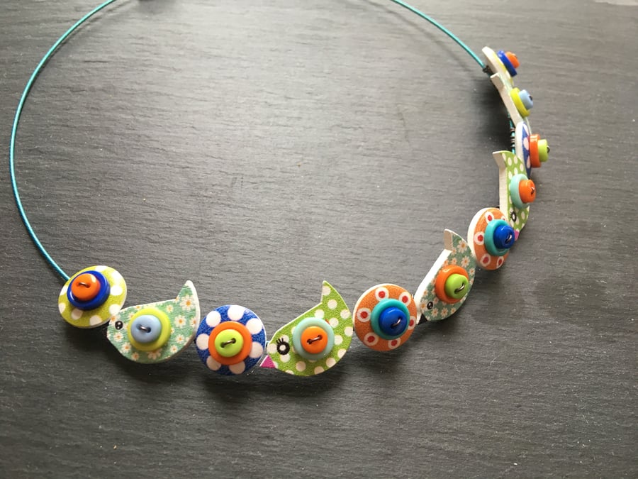 Button Necklace Blue Green and Orange Birds