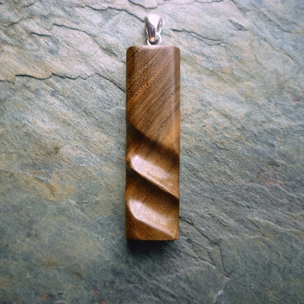 Carved Walnut Wood Pendant, silver bail