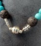 Gemstone bracelet with beads of turquoise and black lava rock - Image 2