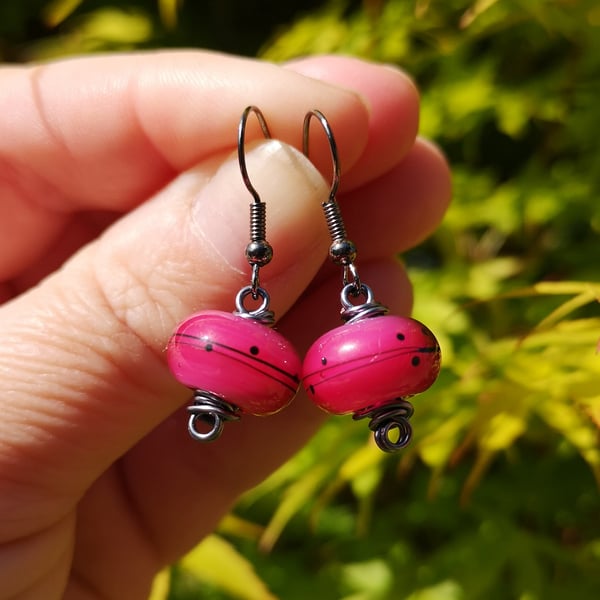 Pink lamp work bead and grey wire work earrings