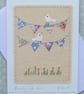 Hand-stitched mini bunting, little white doves, pretty card to keep!