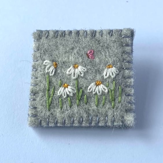 Daisies and butterfly embroidered felt brooch