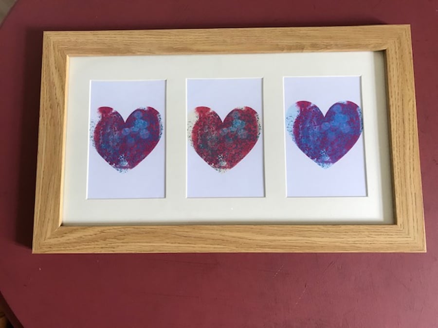Three Hearts Framed Print 