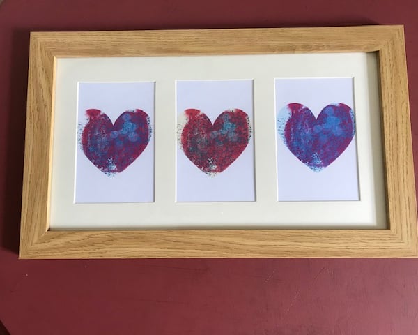 Three Hearts Framed Print 