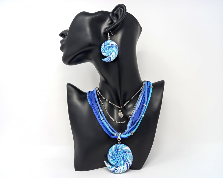 Nautilus spiral earrings in blue, silver & white polymer clay