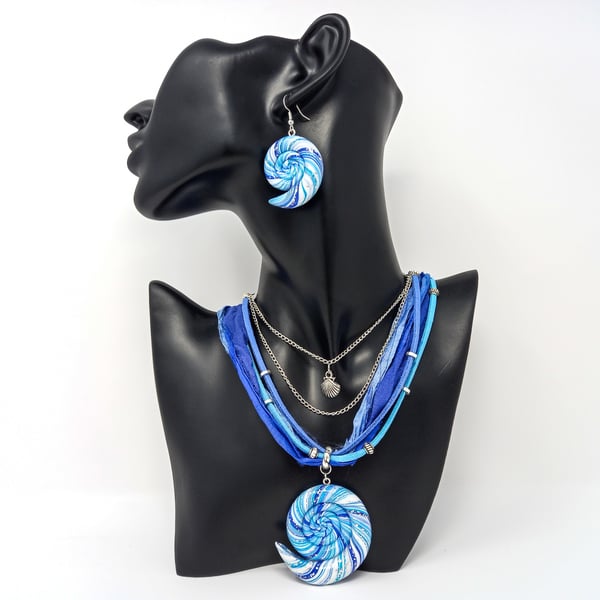 Nautilus spiral earrings in blue, silver & white polymer clay