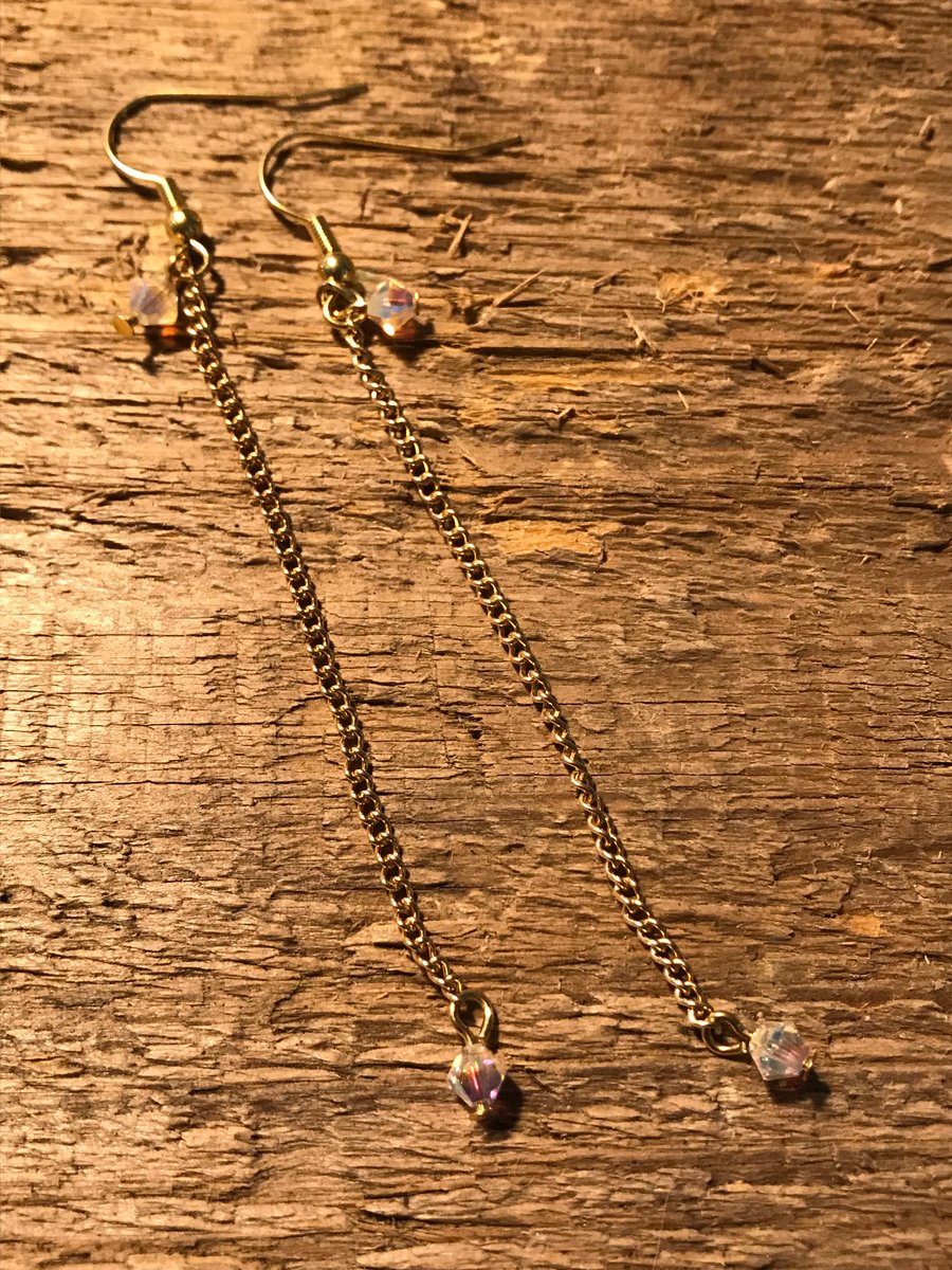 Long Swarovski crystal earrings on gold chain