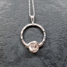 Silver hammered circle quartz pendant. April birthstone. Reiki jewellery