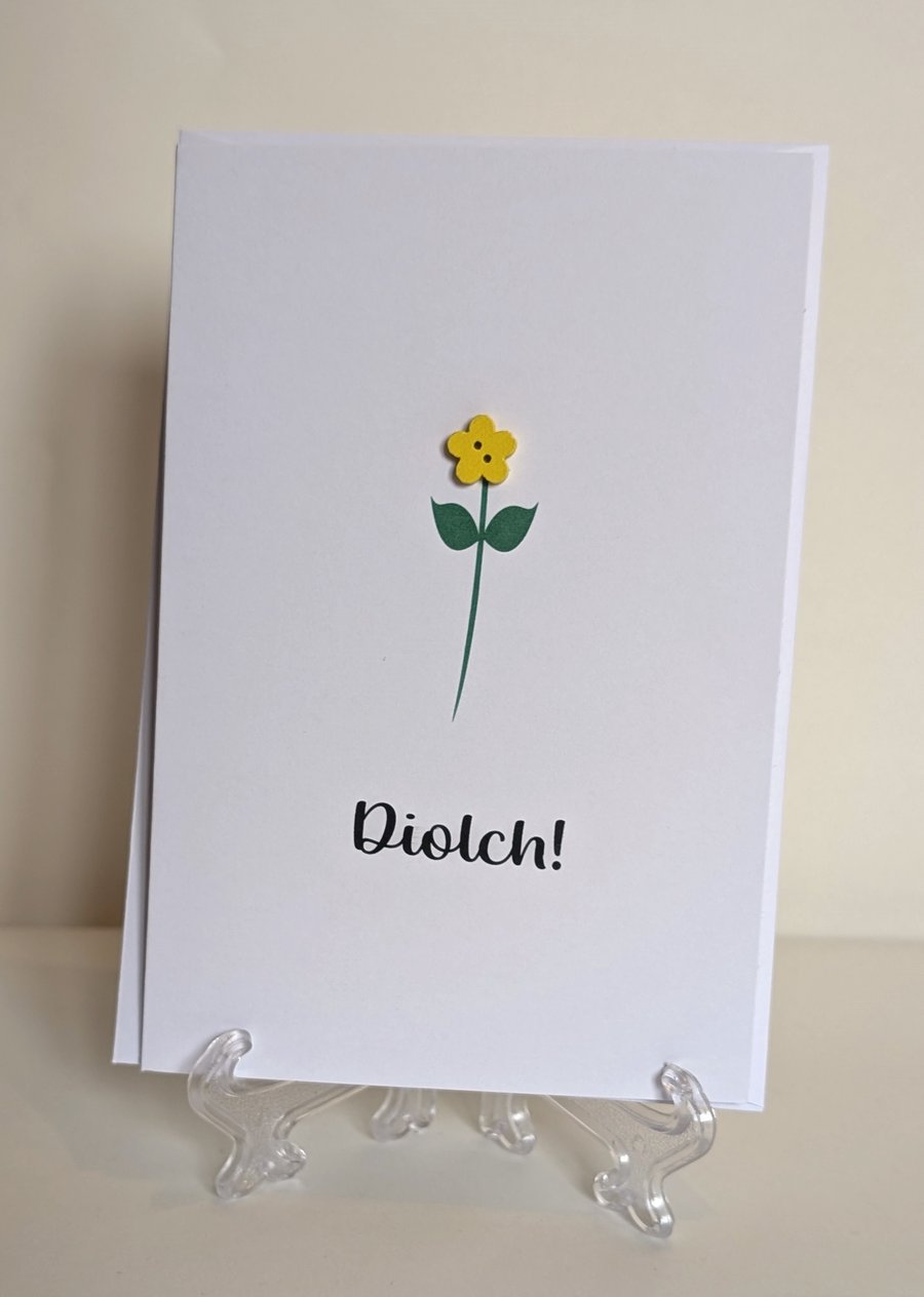 Diolch (Thank you) greetings card with a flower button 