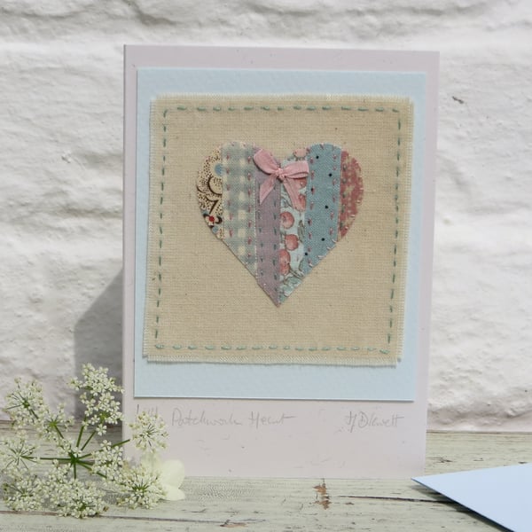 Hand-stitched card, vintage fabrics 'patchwork' with hand-tied silk ribbon bow