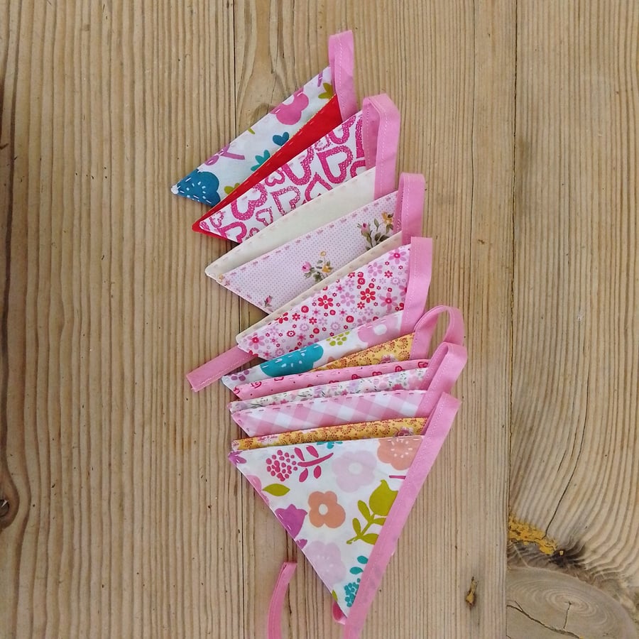Mini bunting in a pink floral theme ideal for party or room decoration