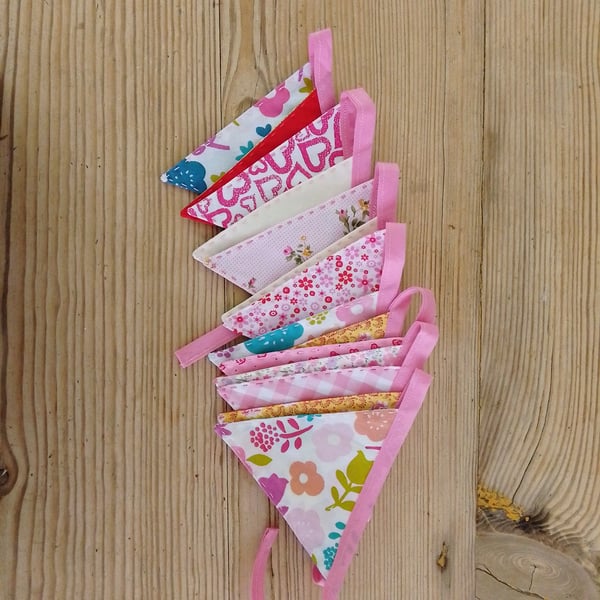 Mini bunting in a pink floral theme ideal for party or room decoration