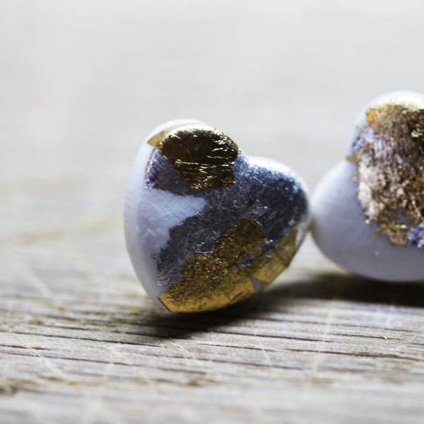 Antiqued heart earrings, white silver and gold
