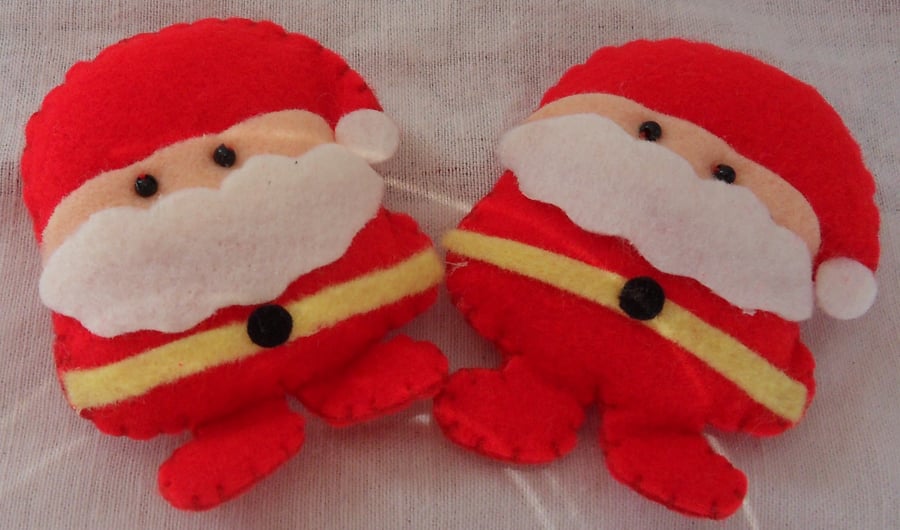 Two felt Father Christmas embellishments. Approx 2". Free postage