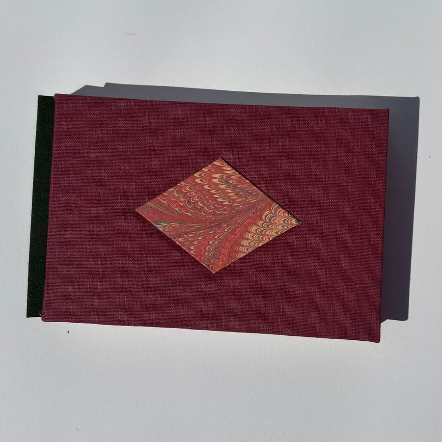 Maroon Book with Marbled Paper