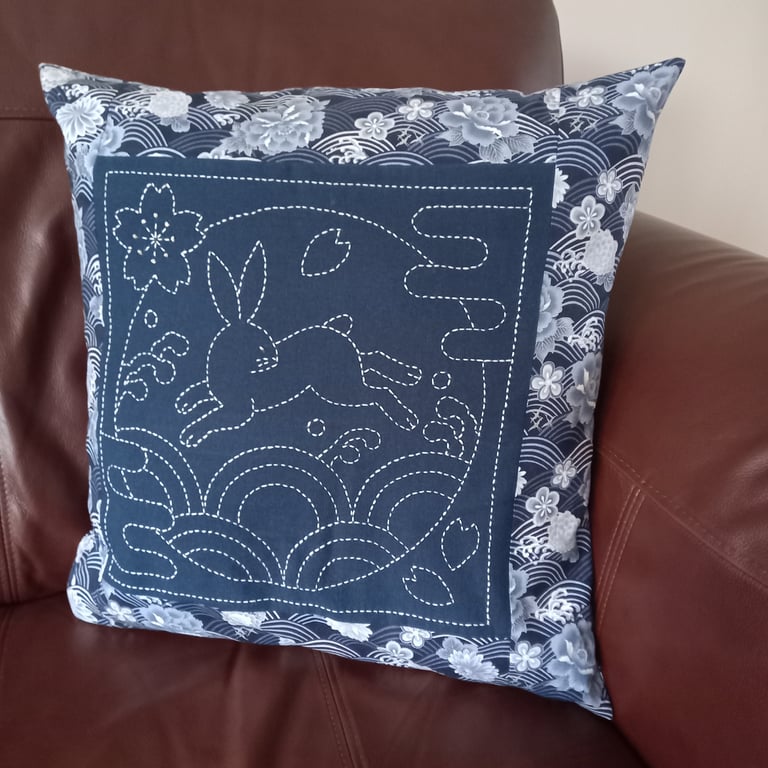 Hand embroidered rabbit cushion