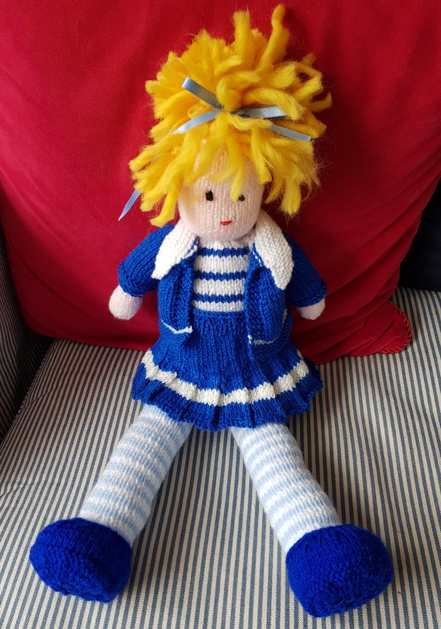 Hand knitted soft doll 