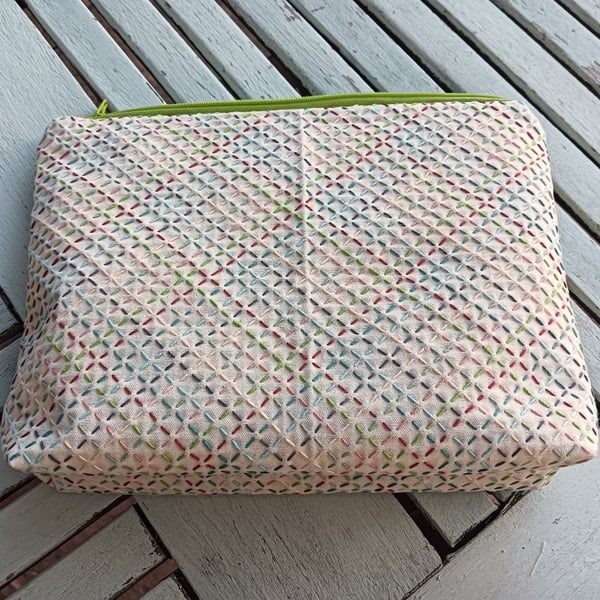 Fabric purse with sashiko embroidery detail 