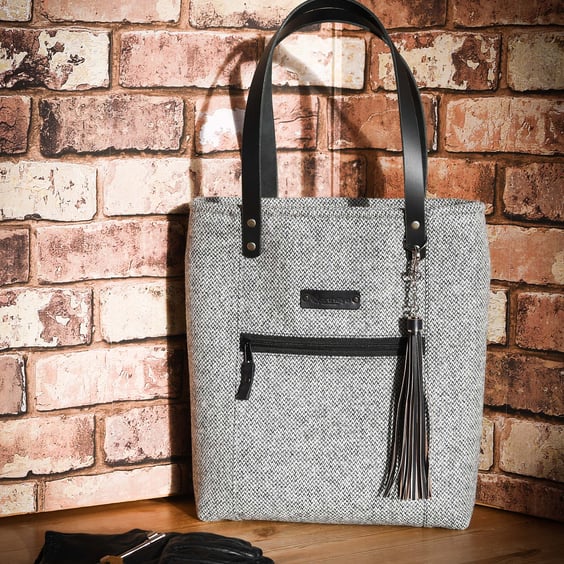 Grey 100% wool tweed tote bag with leather handles and a matching leather tassel