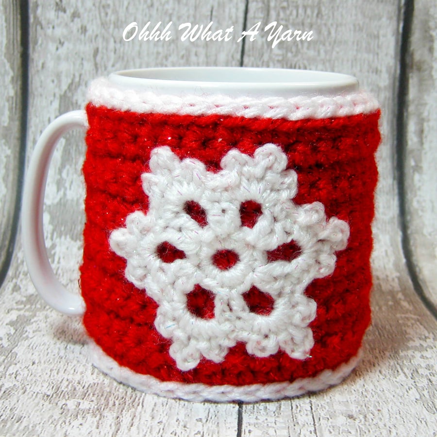 Crochet red and white snowflake mug hug, mug cosy