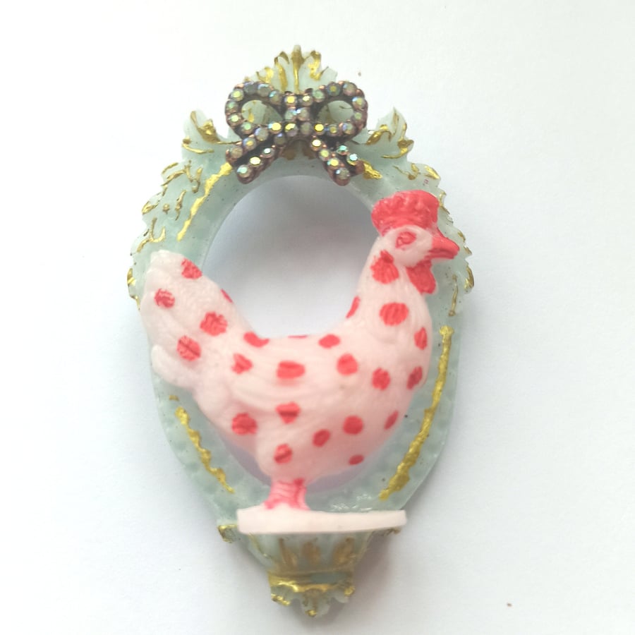 This is one funky chicken! Pink resin brooch