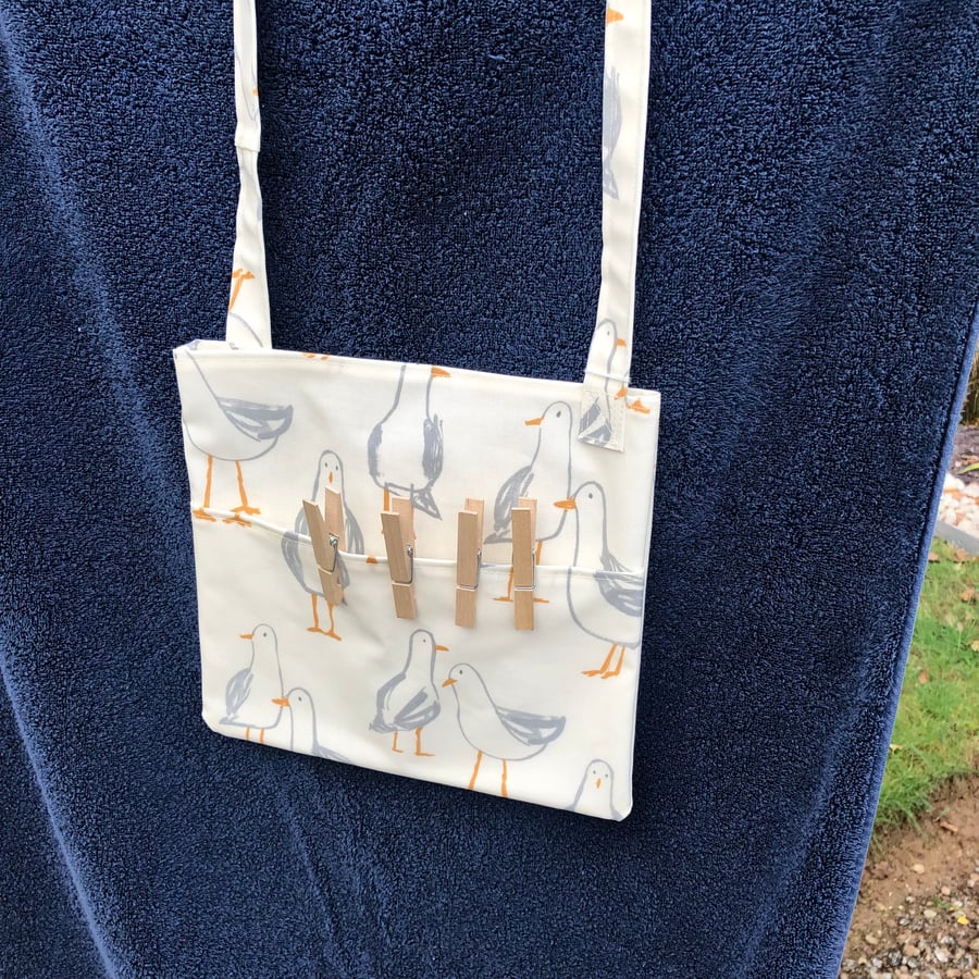 Body Cross PVC Cotton Peg Bag with a Seagull Design.