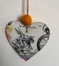 Alice in Wonderland and the Mad March Hare hanging decoupaged hearts