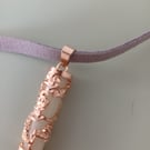 Suede chain with glow in the dark pendant