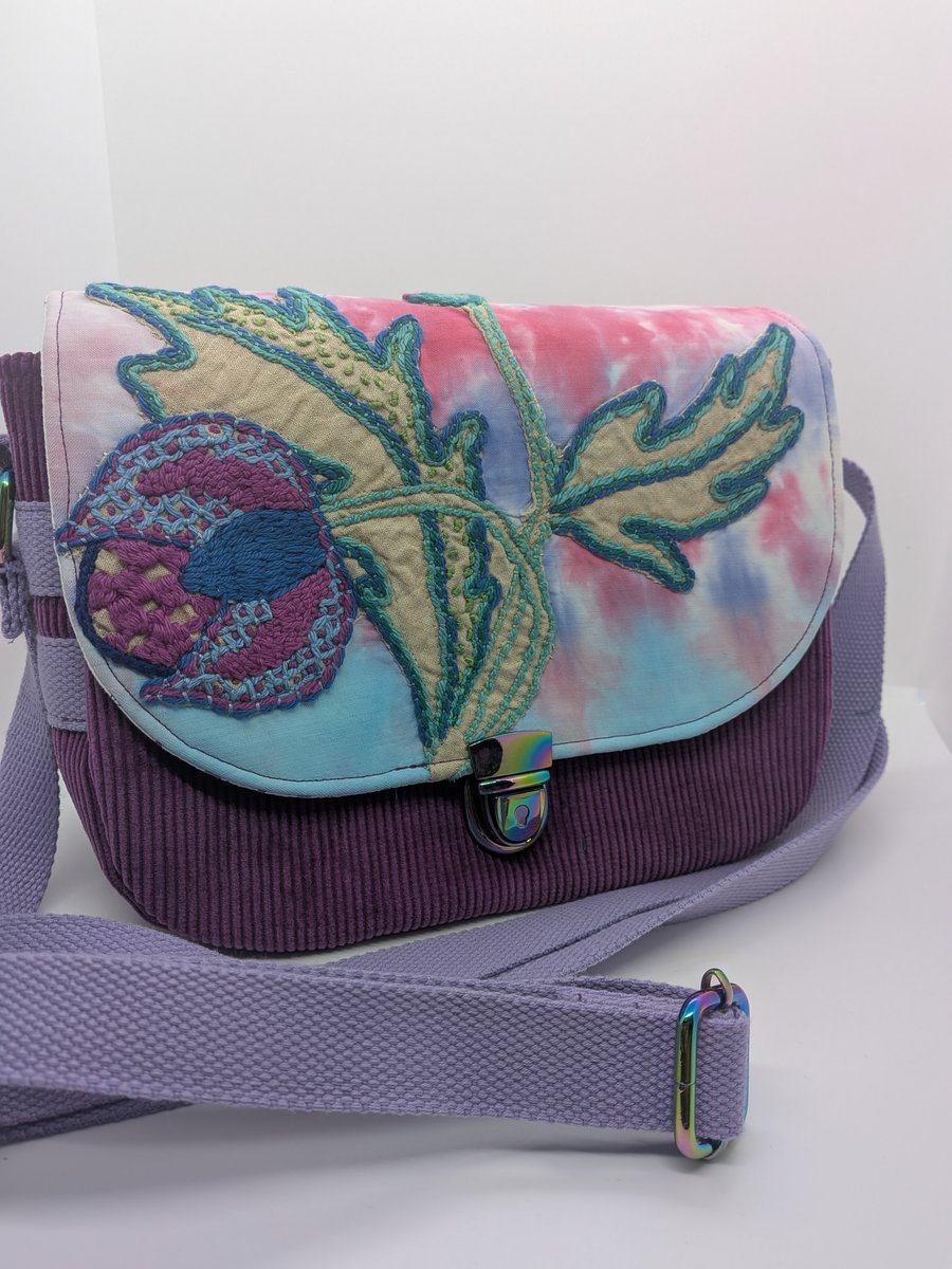 Purple corduroy handbag with vintage embroidery flap detail