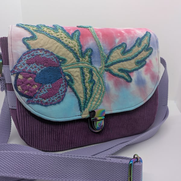 Purple corduroy handbag with vintage embroidery flap detail